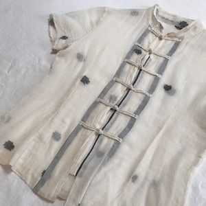Delicate lightweight hand woven transparent blouse